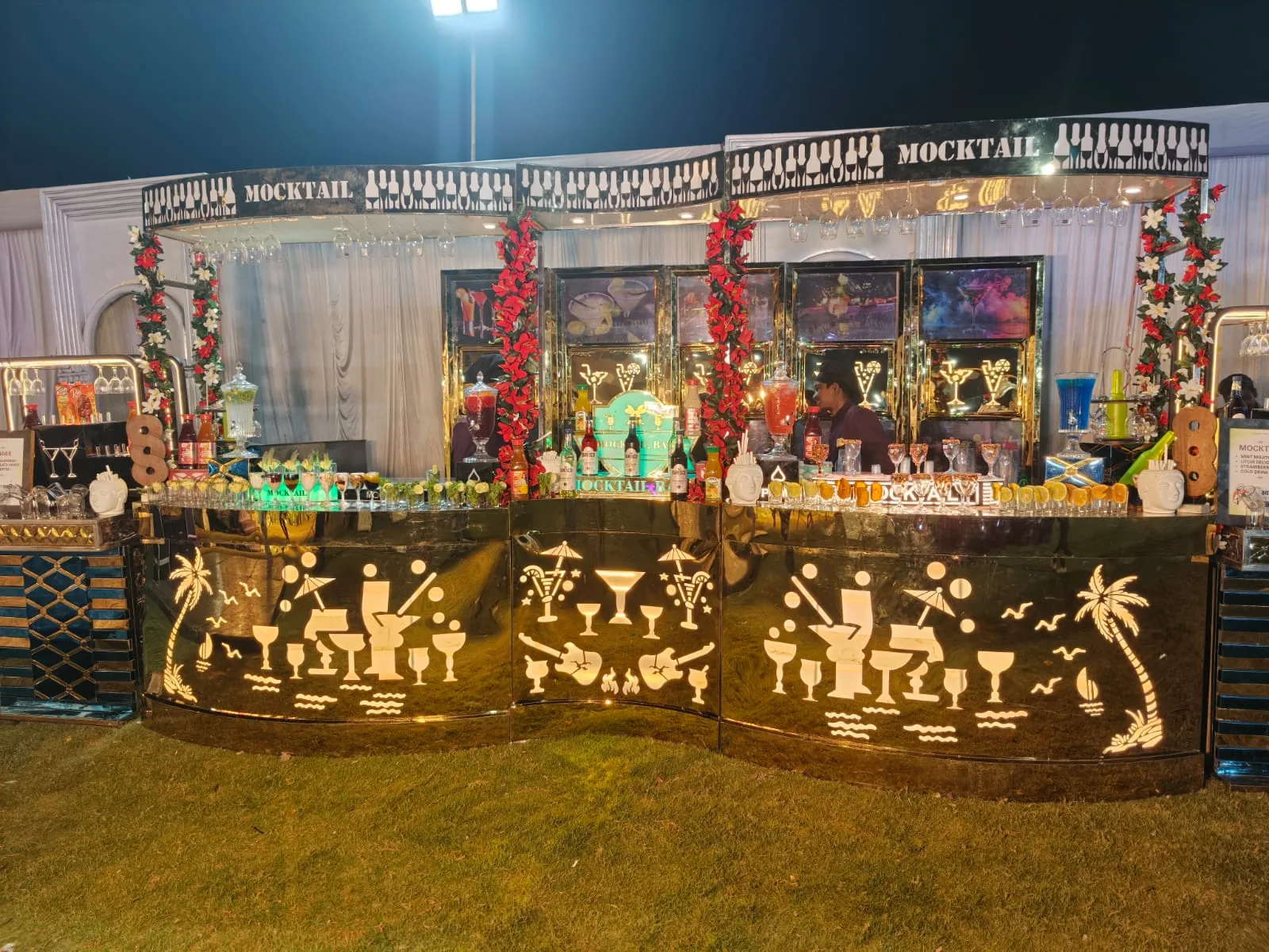 Illuminated mocktail bar arranged for an Indian wedding
