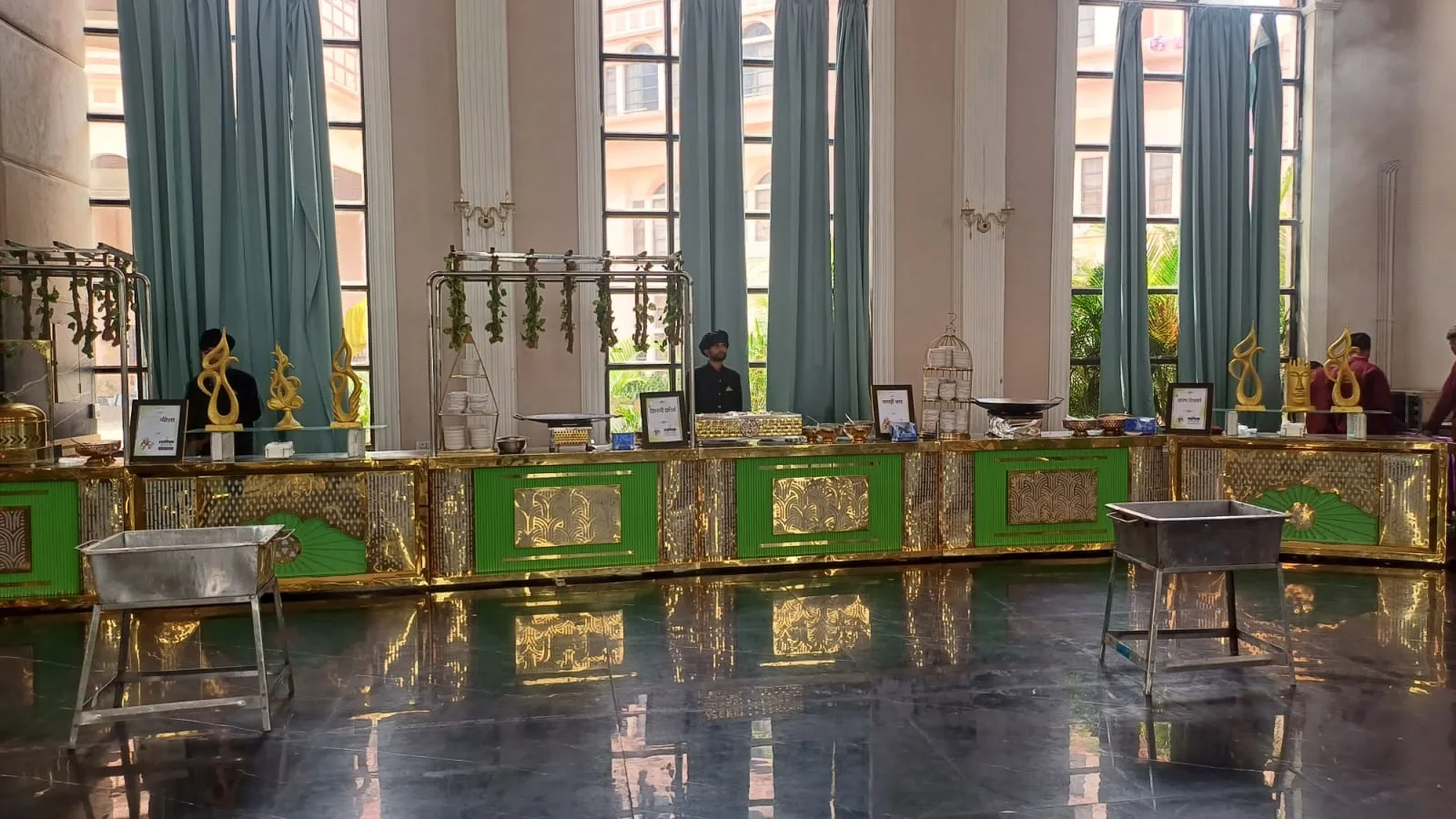 Elegant indoor vegetarian buffet counters by Swastik Caters