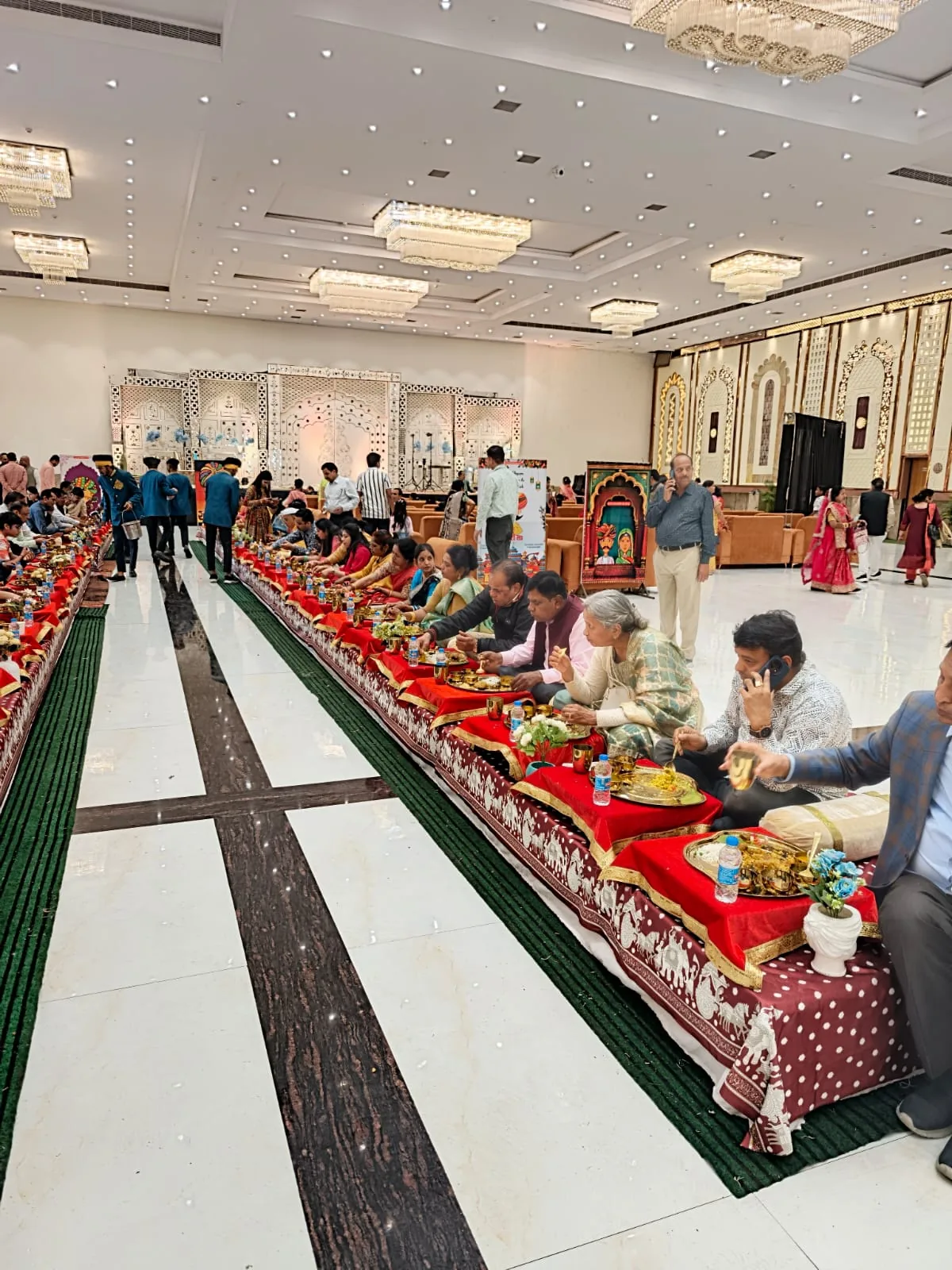 Guests seated for traditional Indian dining service