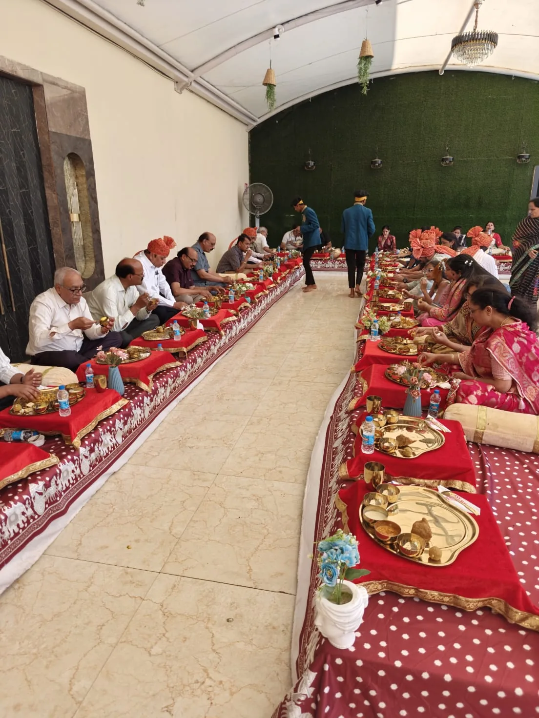 Traditional seated wedding meal service for family guests
