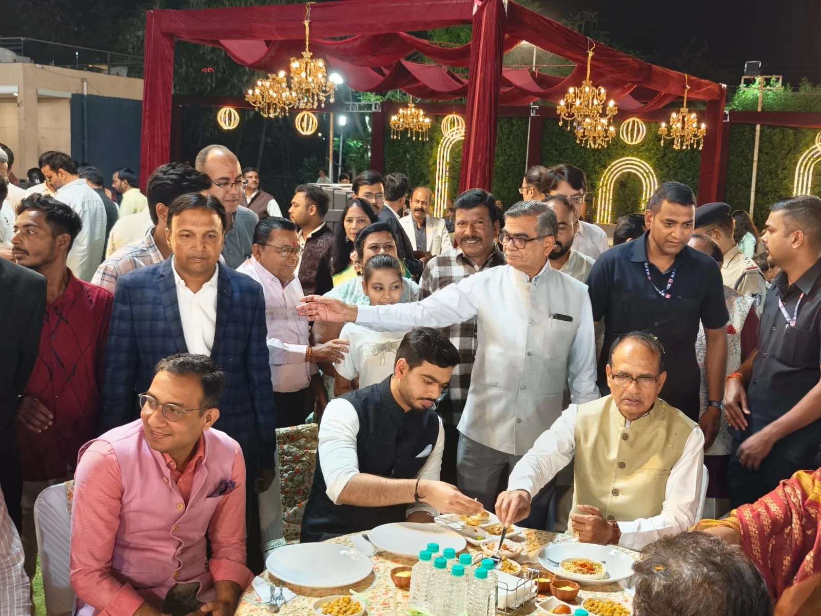 Guests enjoying food catered by Swastik Caters at a celebration